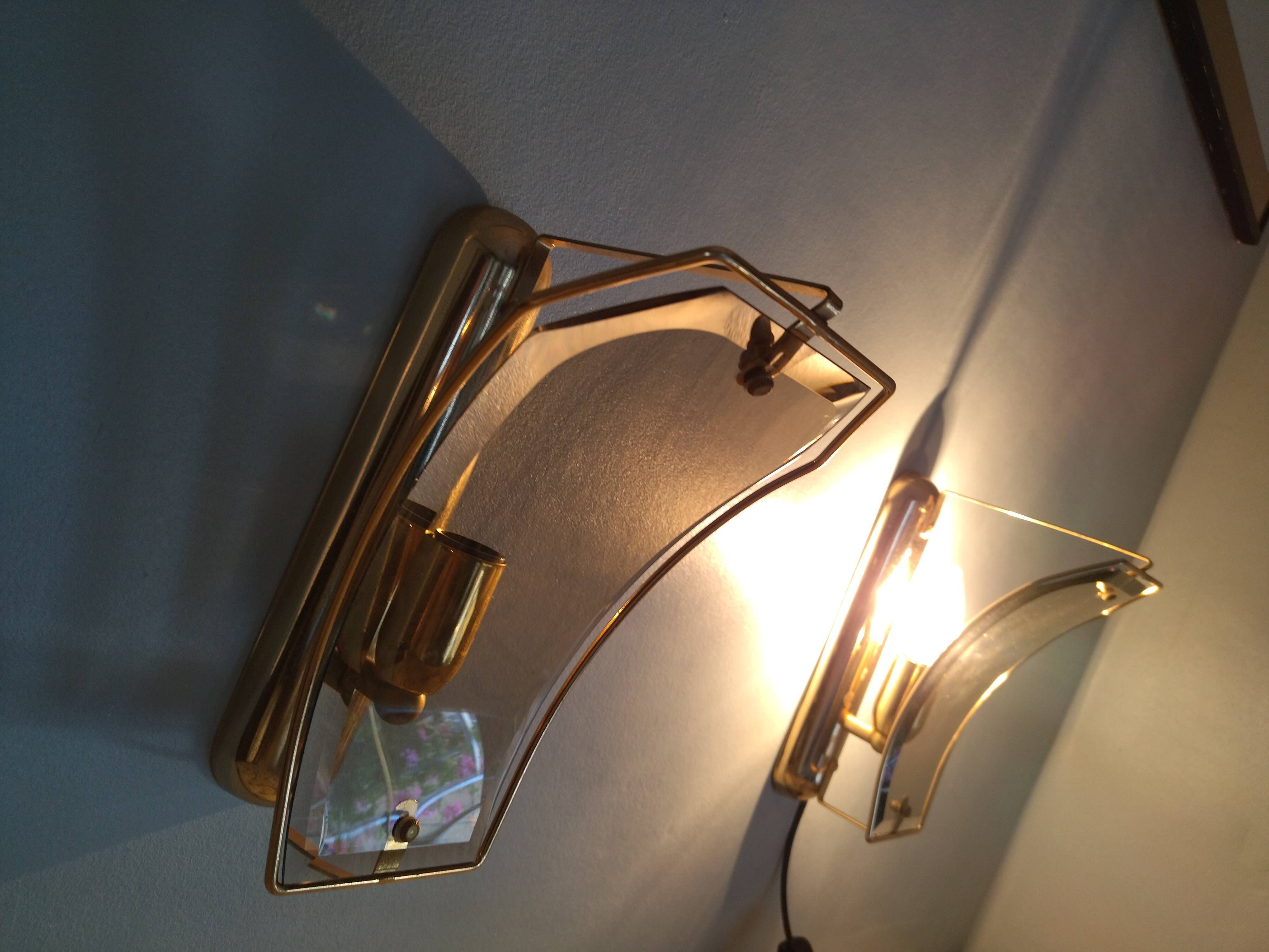 Pair of brass and curved glass wall lamps from the 80s