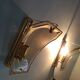 Pair of brass and curved glass wall lamps from the 80s