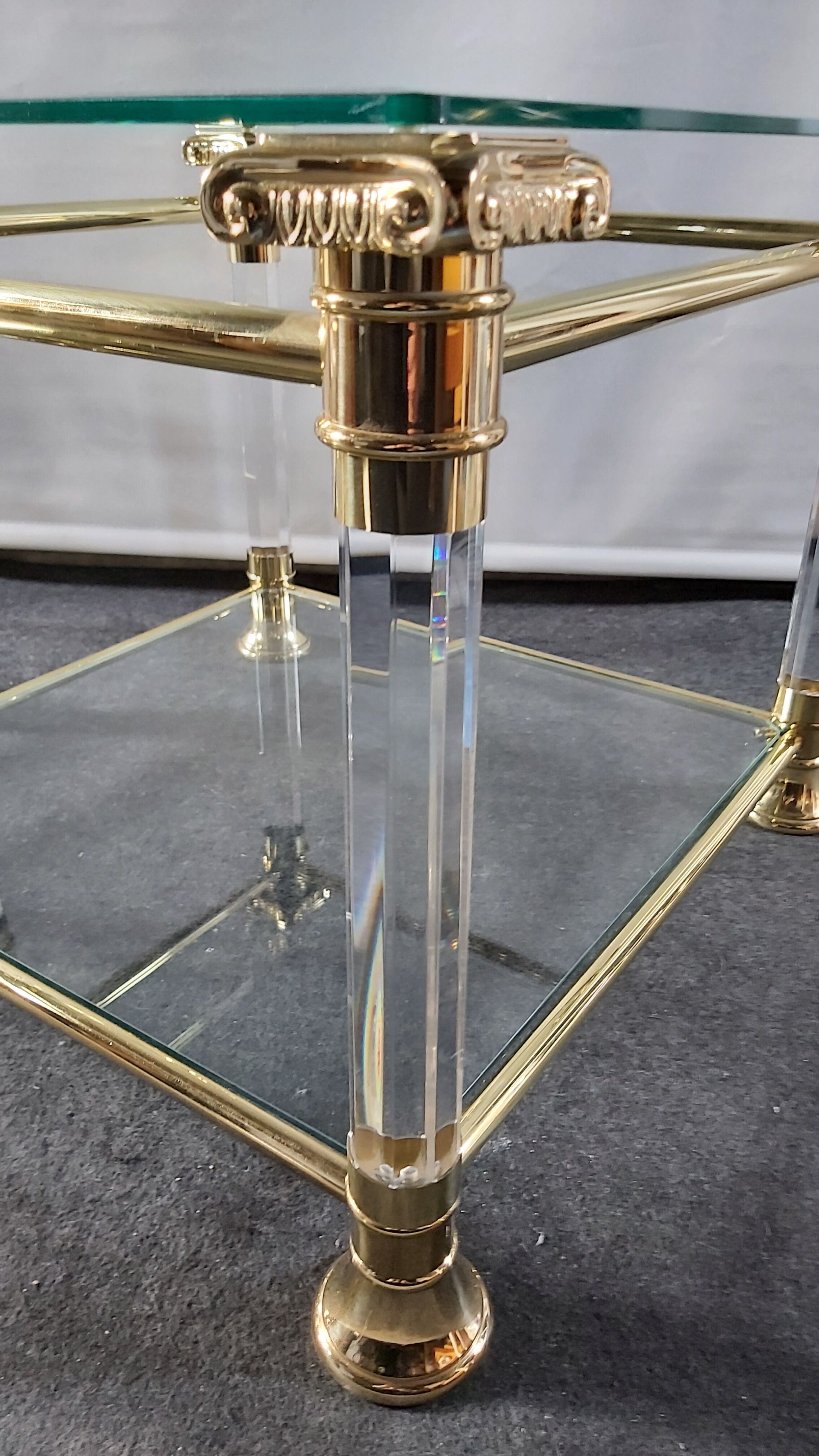 Pair of tables in brass, acrylic and glass