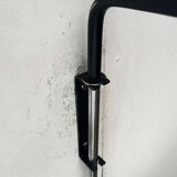 Mid-century modern Danish extendable cantilever wall lamp with a rattan shade, 1960s.