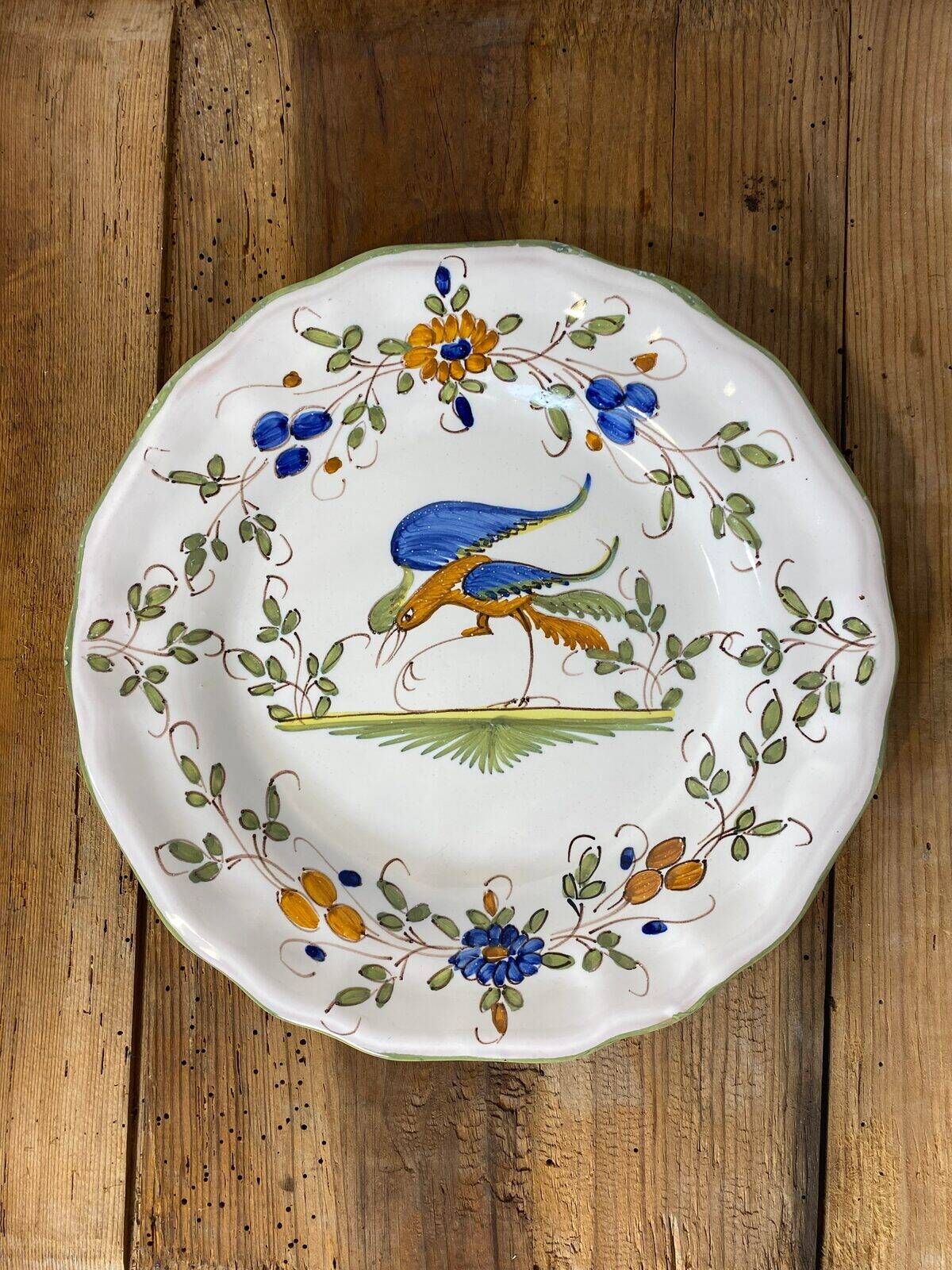 Set of 6 earthenware plates from Moustiers, featuring birds and flowers.