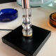 Silver-plated metal lamp base with crystal.
