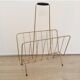 Vintage magazine rack in gold metal