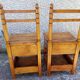 2 old wooden children's chairs with a small chest.