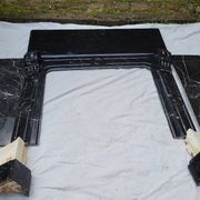 Pompadour fireplace with black marble modillions