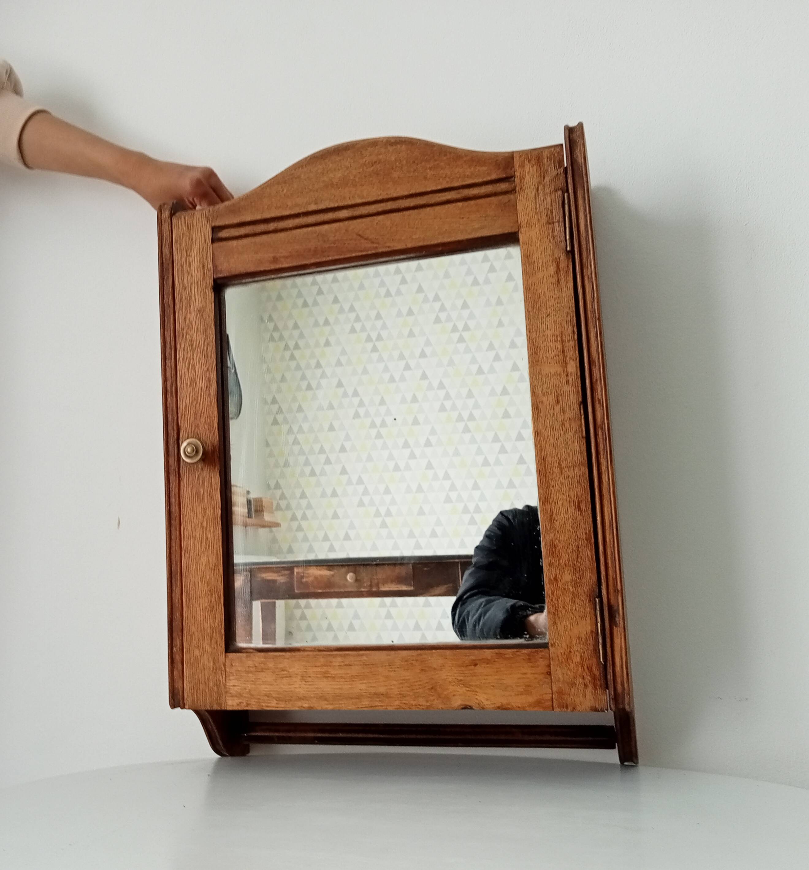 Antique solid oak bathroom cabinet from the early 20th century