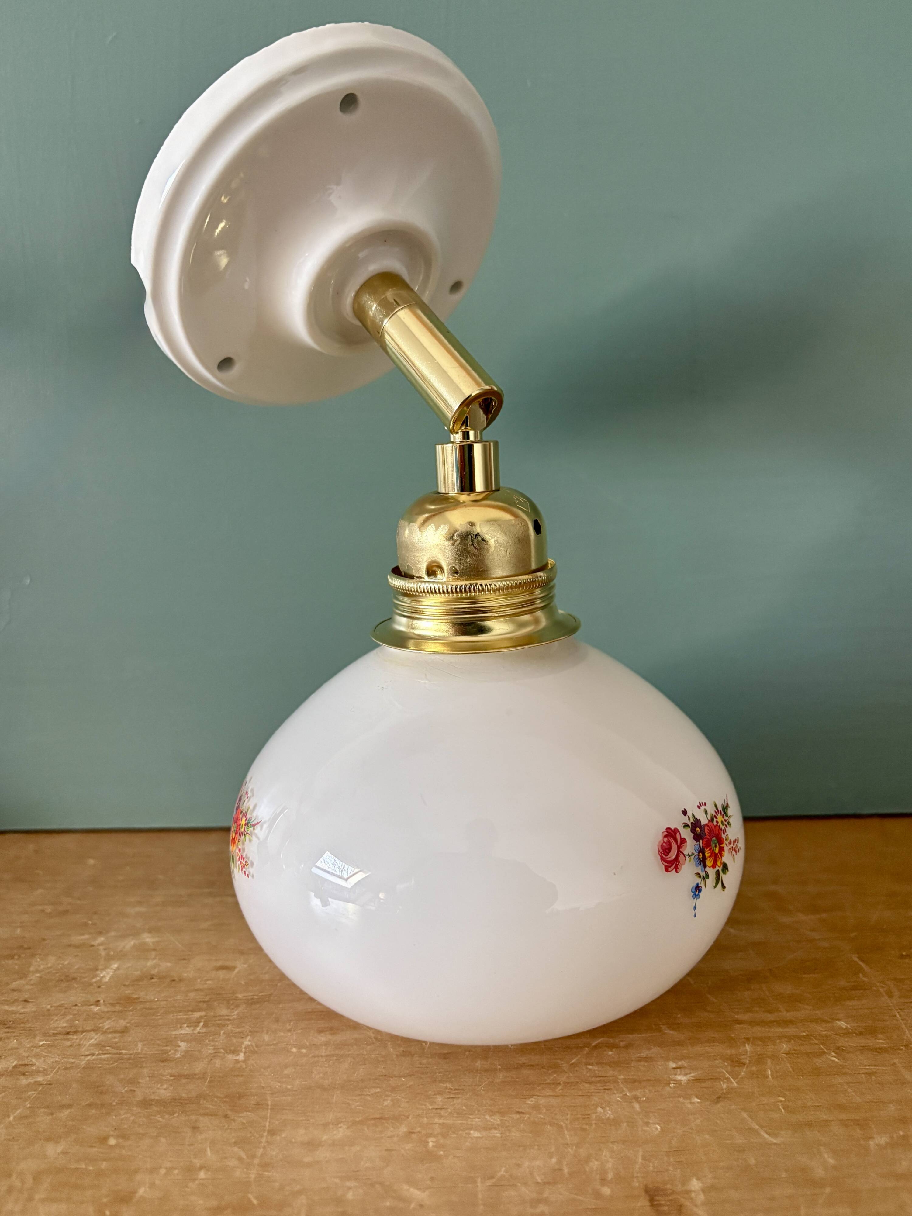 Vintage globe wall sconce in white opaline glass with floral decorations