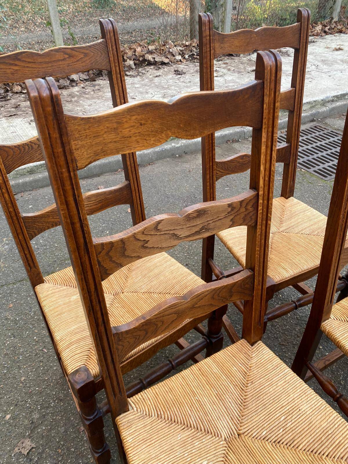 4 solid wood chairs with straw seats and high backs, 108cm.