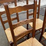 4 solid wood chairs with straw seats and high backs, 108cm.