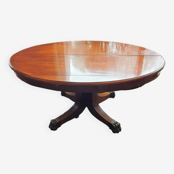 Oval walnut table with extensions