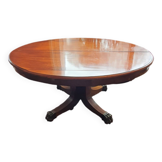 Oval walnut table with extensions