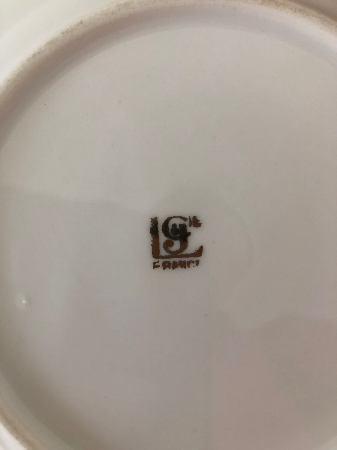12 white porcelain dessert plates from Limoges CG Cie