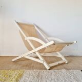 Old white wood deck chair Triconfort