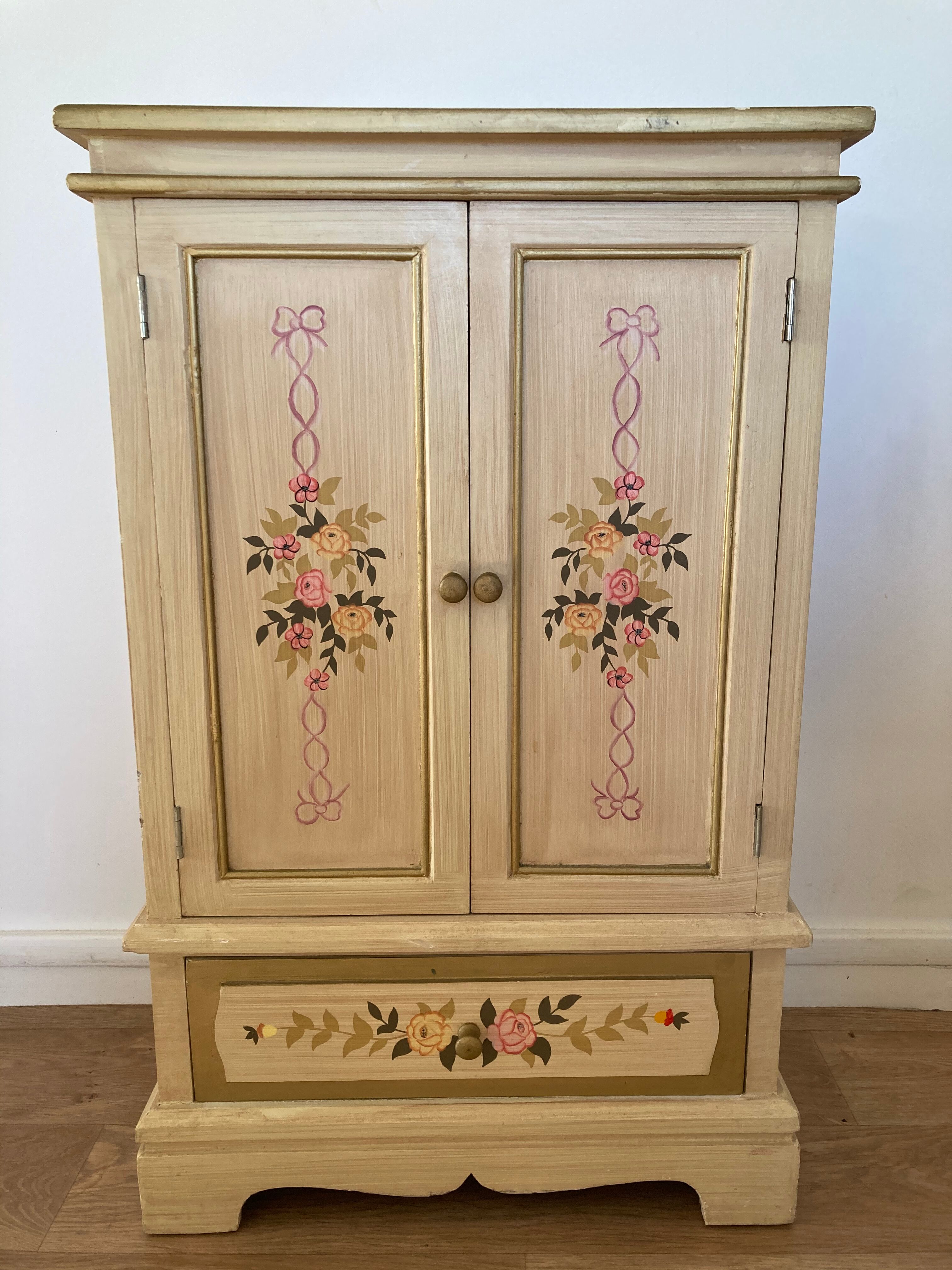 2-door flowered wooden cabinet