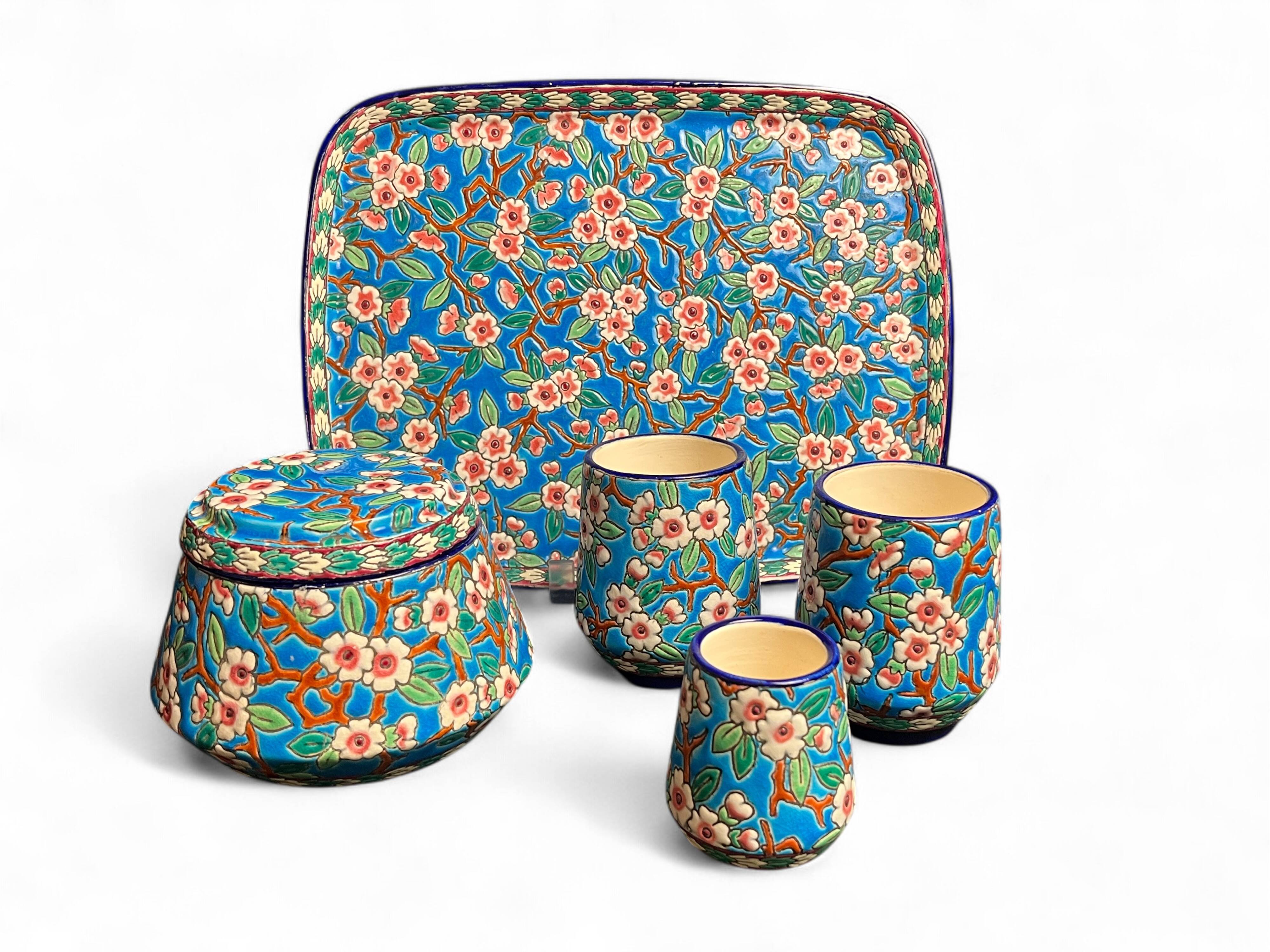 Longwy, cherry blossom glazed earthenware smoking set, early 20th century