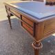 Double-sided flat desk in Louis XVI style made of mahogany and leather.