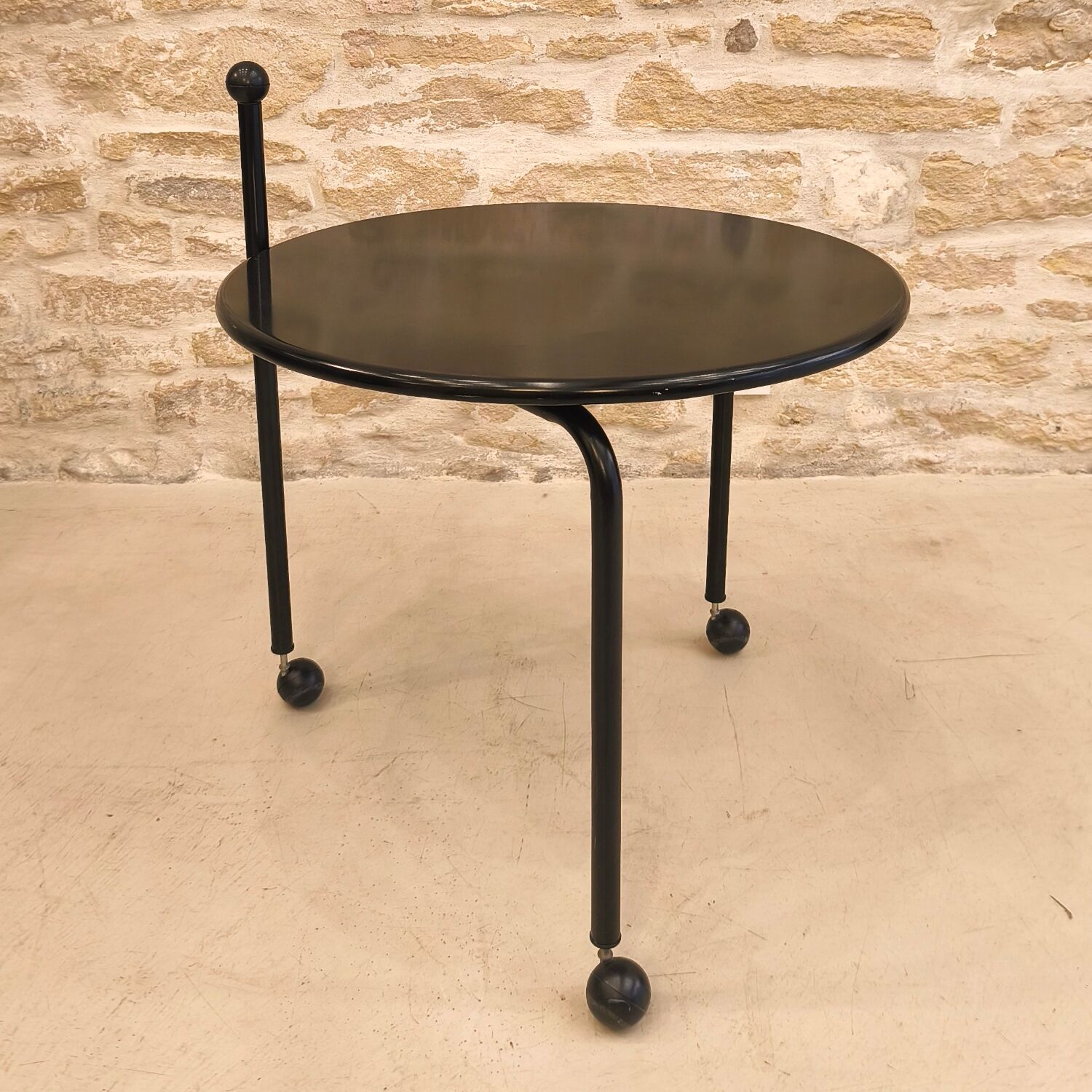 Foldable metal side table, design by Tord Bjorklund, Ikea.