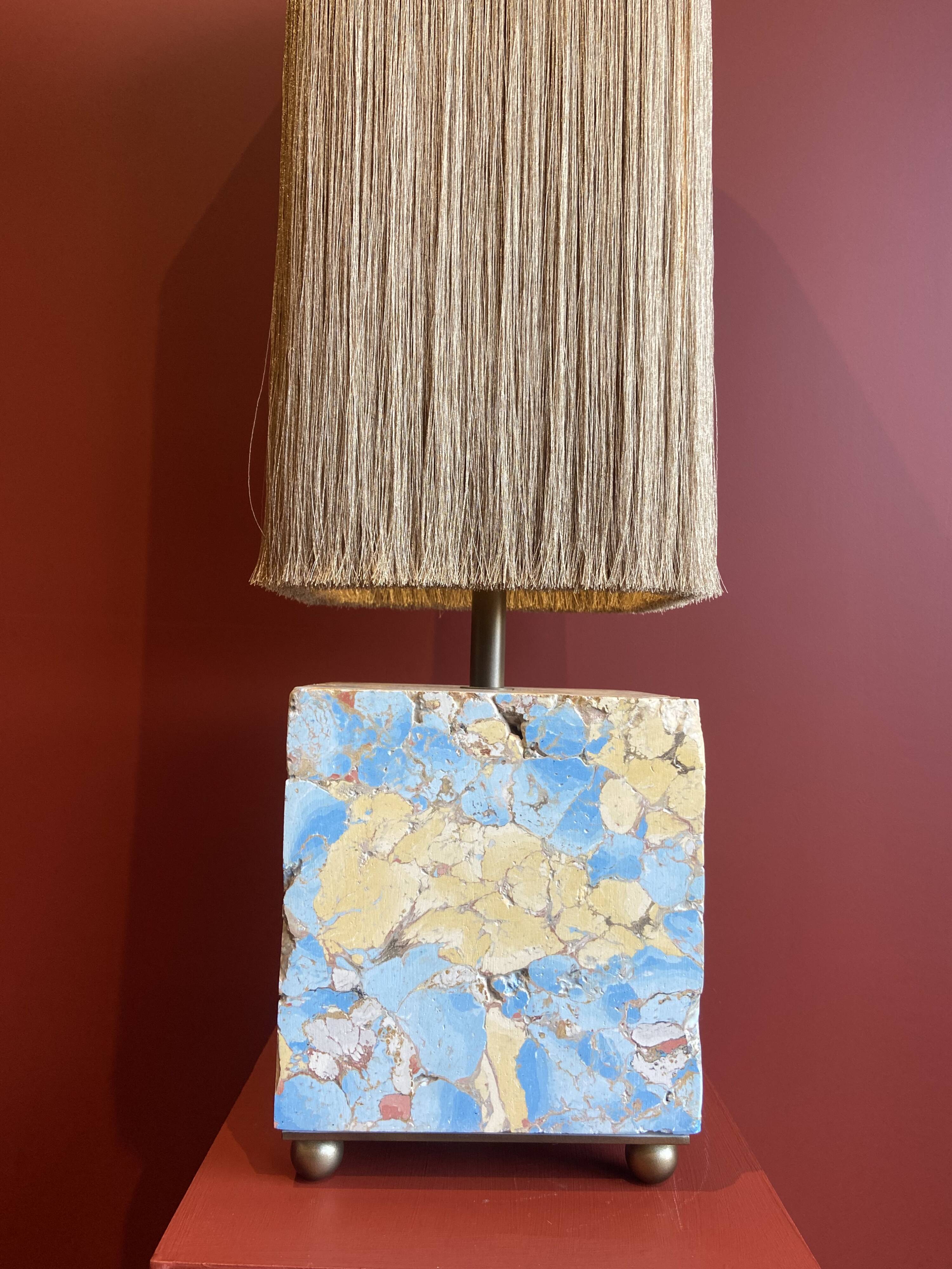 Base stuck blue beige marble-plaster, fringed lampshade Houles, 21st century.