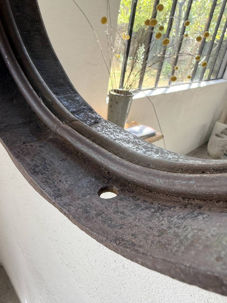 Brutalist mirror with metal chain from the 50s