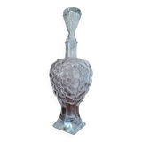Old carafe in pressed glass grape cluster style