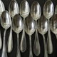 Lot of 12 teaspoons of silver metal
