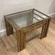 Set of 3 nesting tables in brass and glass. French work by Guy Lef.