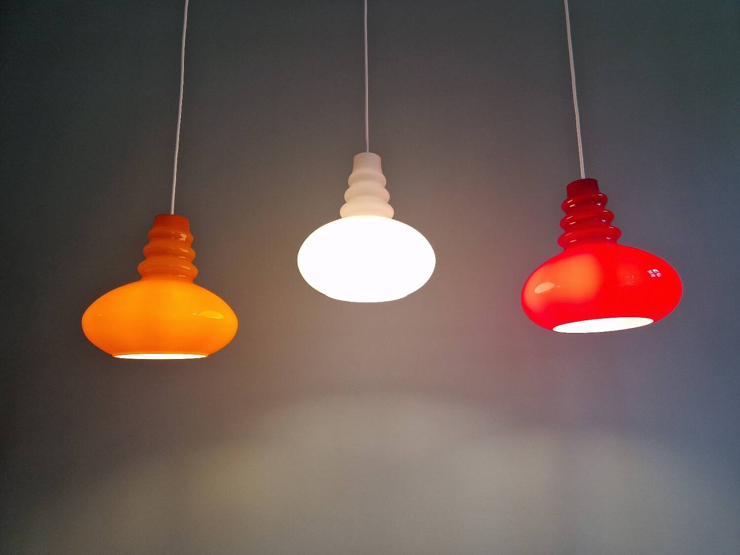 Trio of Space Age opaline pendant lights, Peill & Putzler, 1970