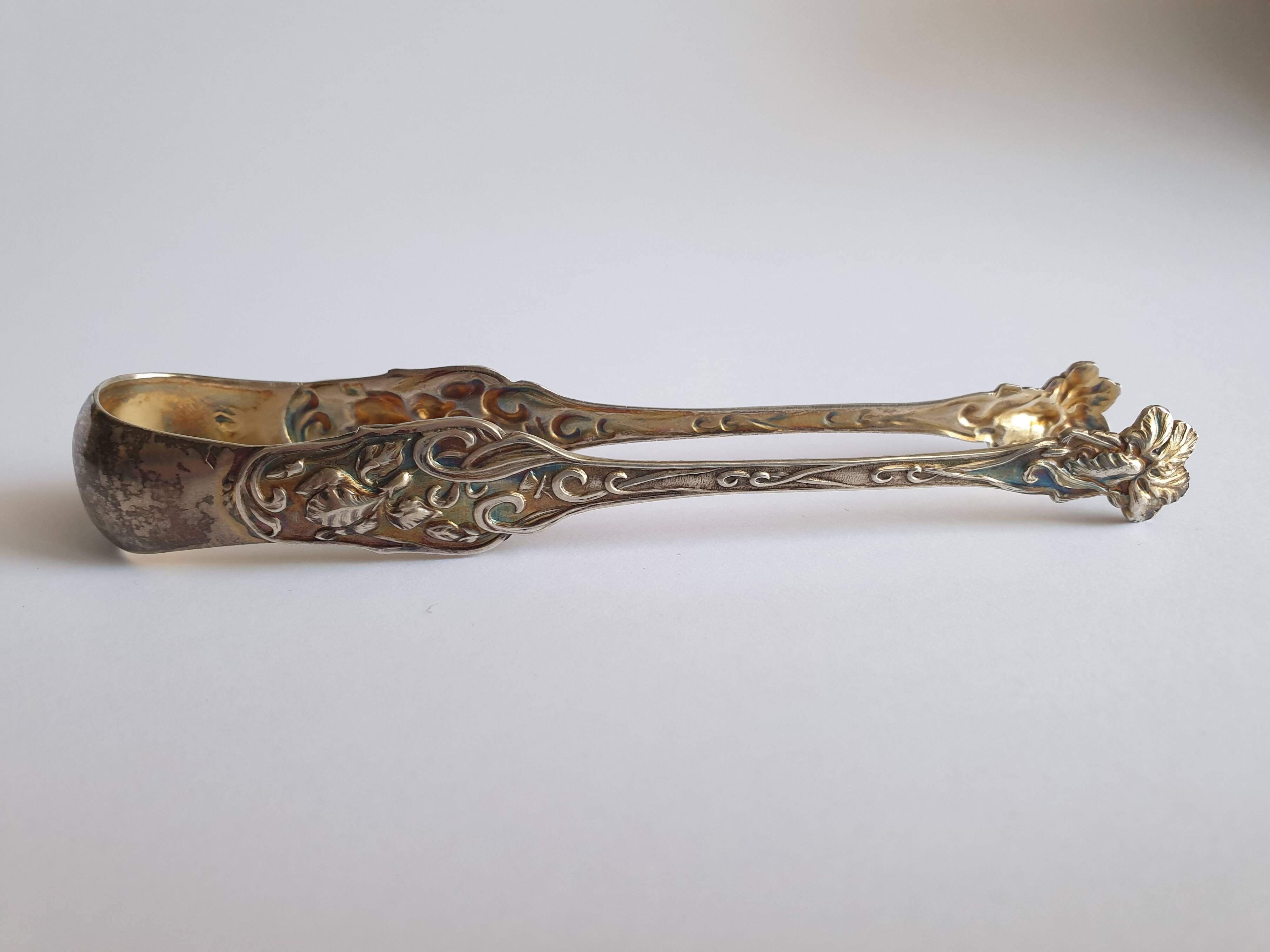 Art Nouveau sugar tongs in solid silver and vermeil