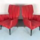 Mid-century modern pair of red armchairs. italy 1950s