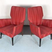Mid-century modern pair of red armchairs. italy 1950s