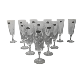 Ensemble de 12 flûtes à champagne, modèle “Versailles”, Cristal d’arques, 70’s.