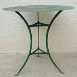 Old metal tripod garden pedestal