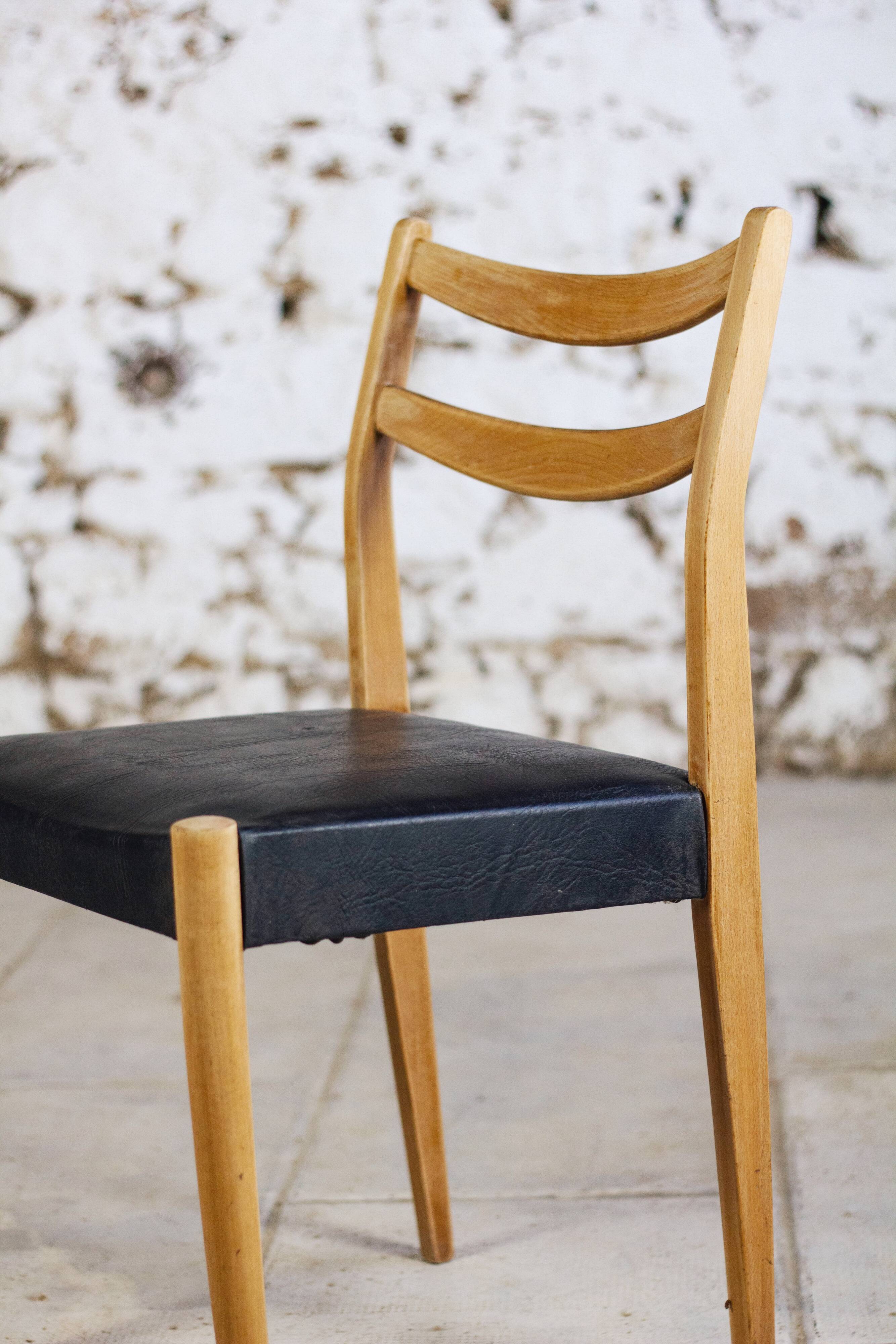 Scandinavian chair in teak and faux leather, 1960.