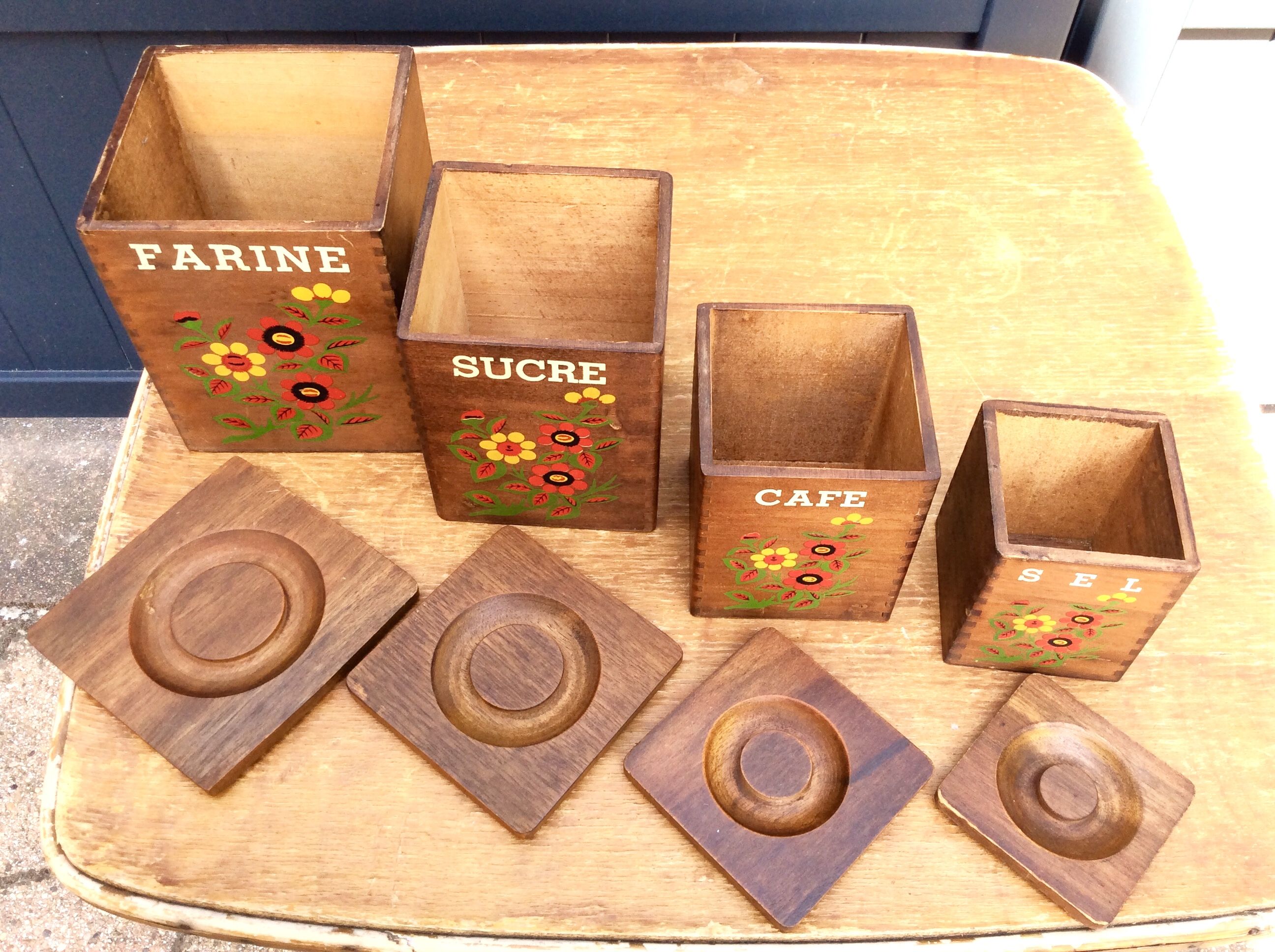 Set of four wooden kitchen boxes
