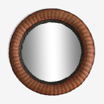 Vintage round mirror with colored rattan edge.