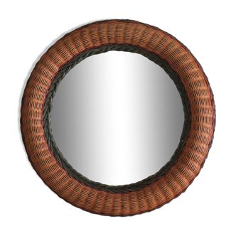Vintage round mirror with colored rattan edge.