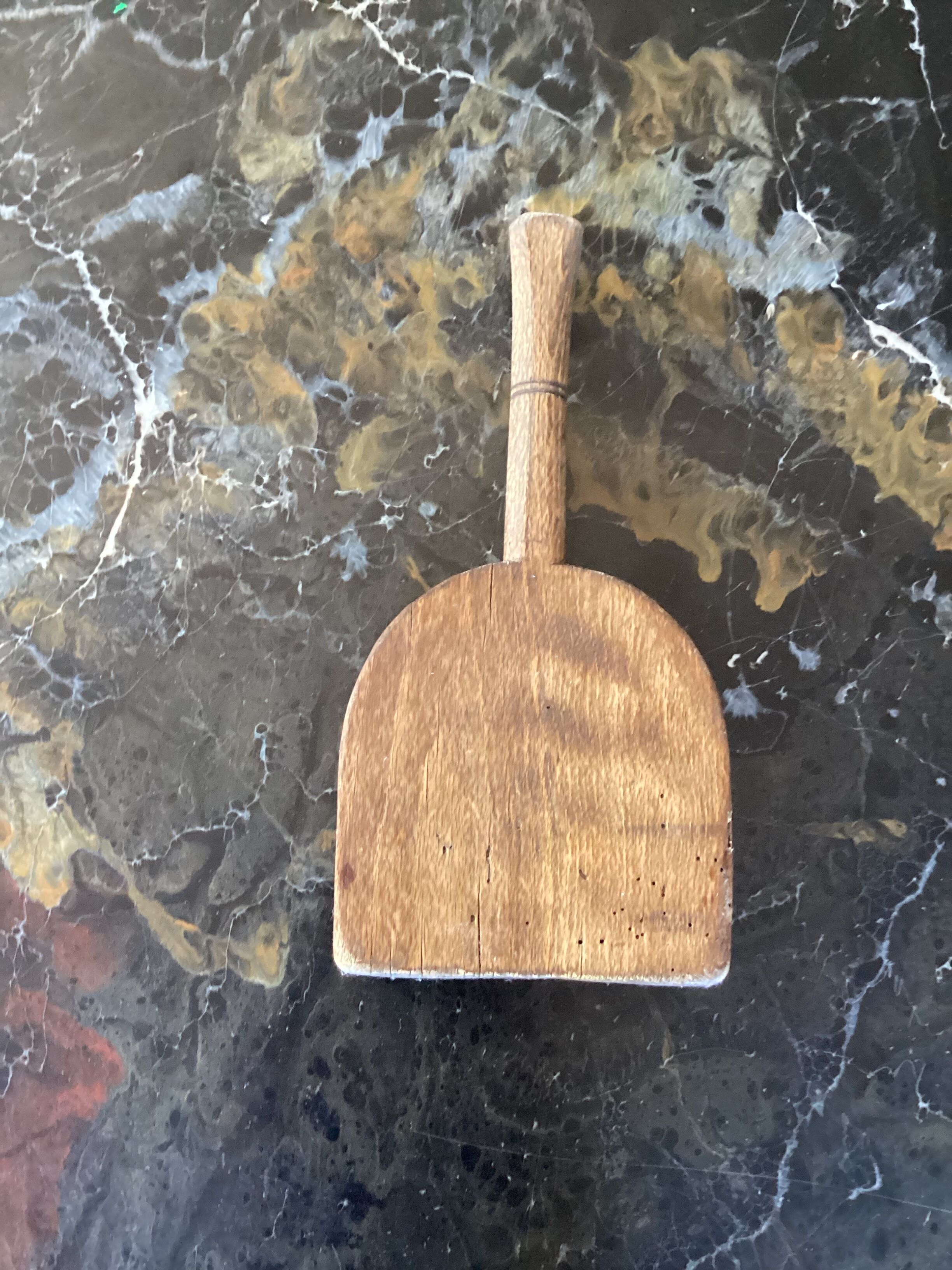 Old wooden clothes beater