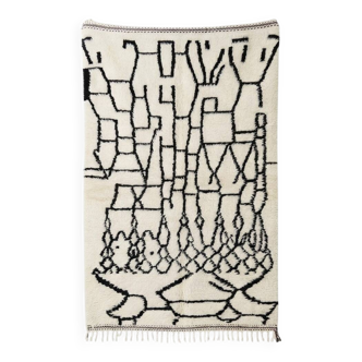 Black and white Berber rug in Azilal style.