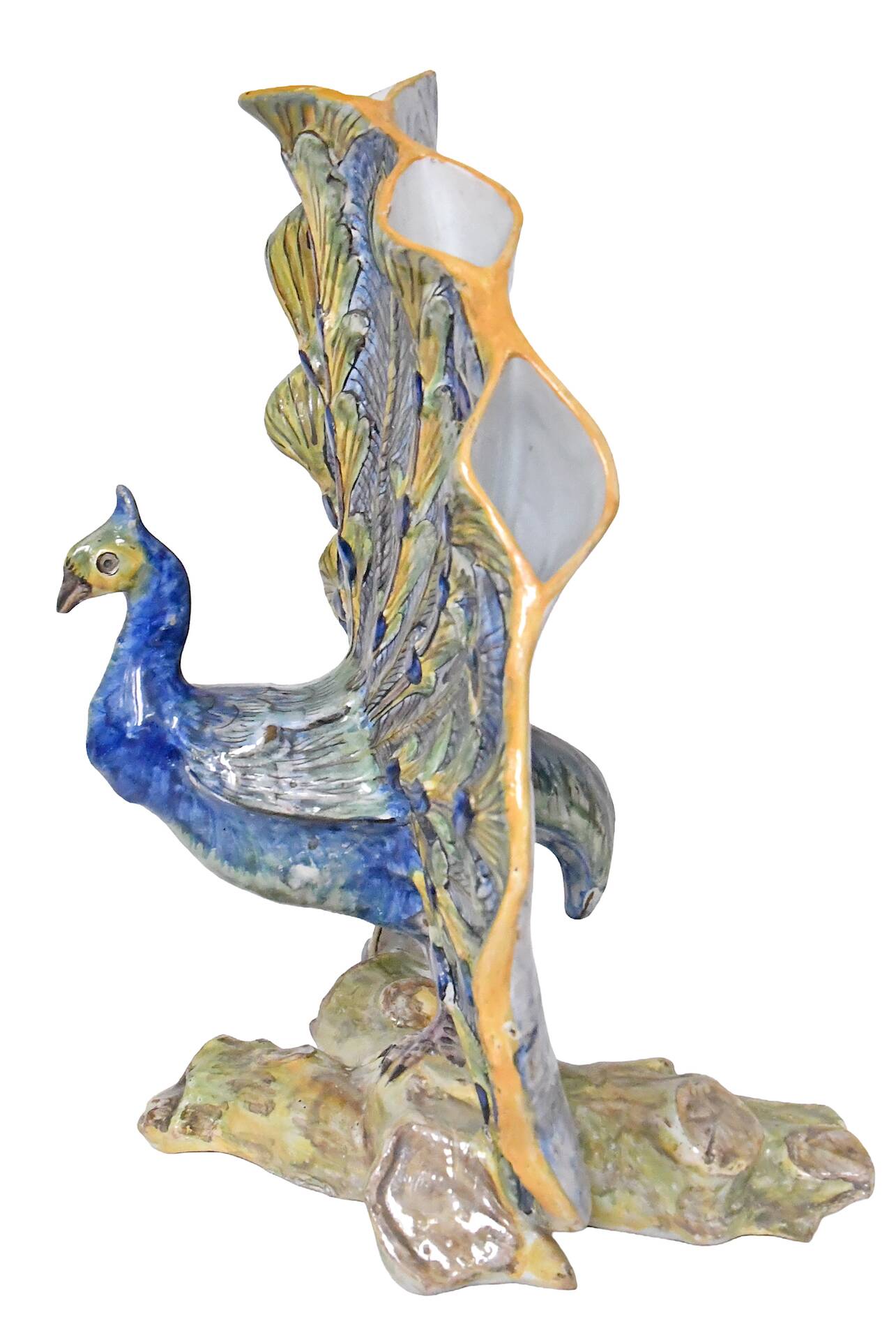 Faience bouquet holder from Desvres in the shape of a peacock.