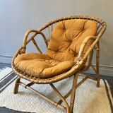 Rattan basket armchair with its cushion