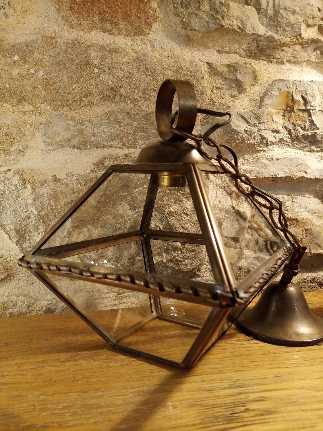 Glass and brass suspension