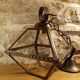 Glass and brass suspension