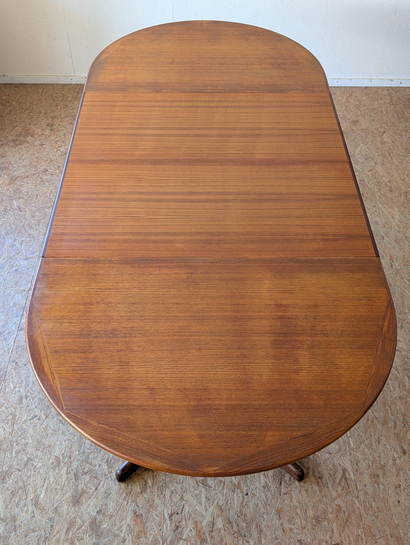 Scandinavian teak oval table from the 1960s, extendable up to 243 cm.