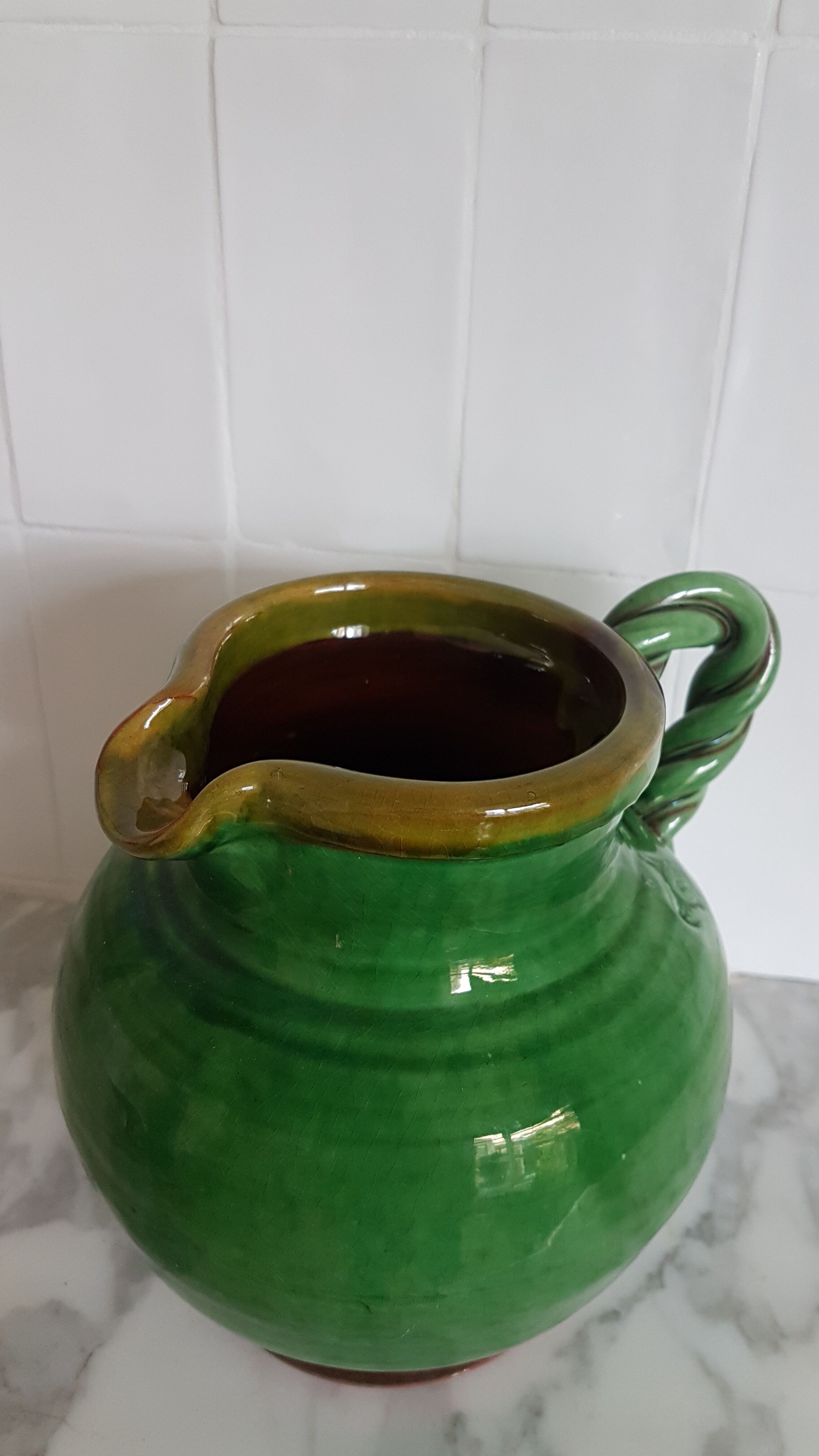 Green ceramic jug