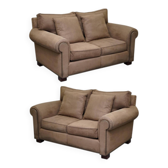 Ralph Lauren Jamaica velvet sofa pair with feather cushions.