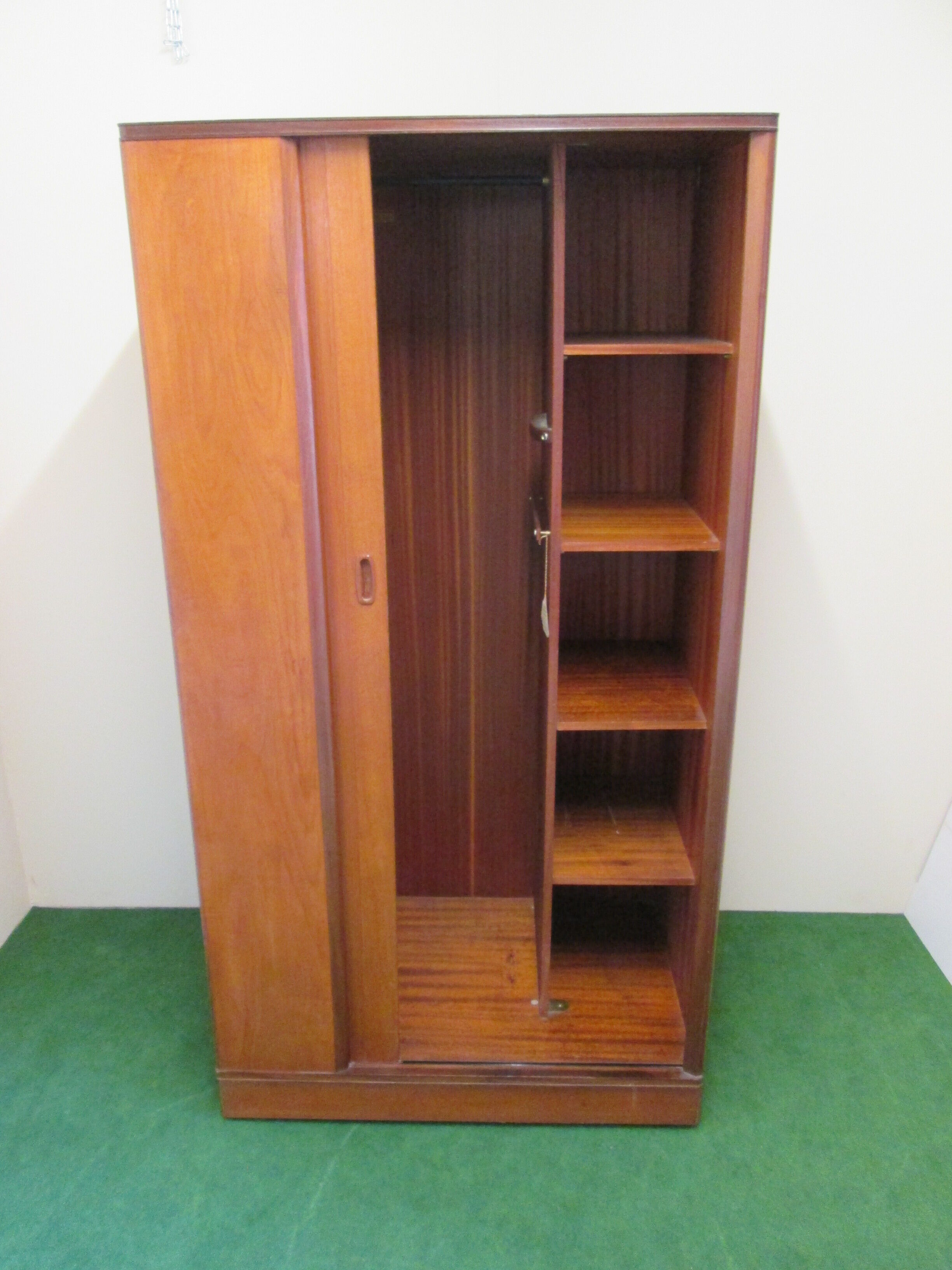 Teak cabinet with shuttered sliding door