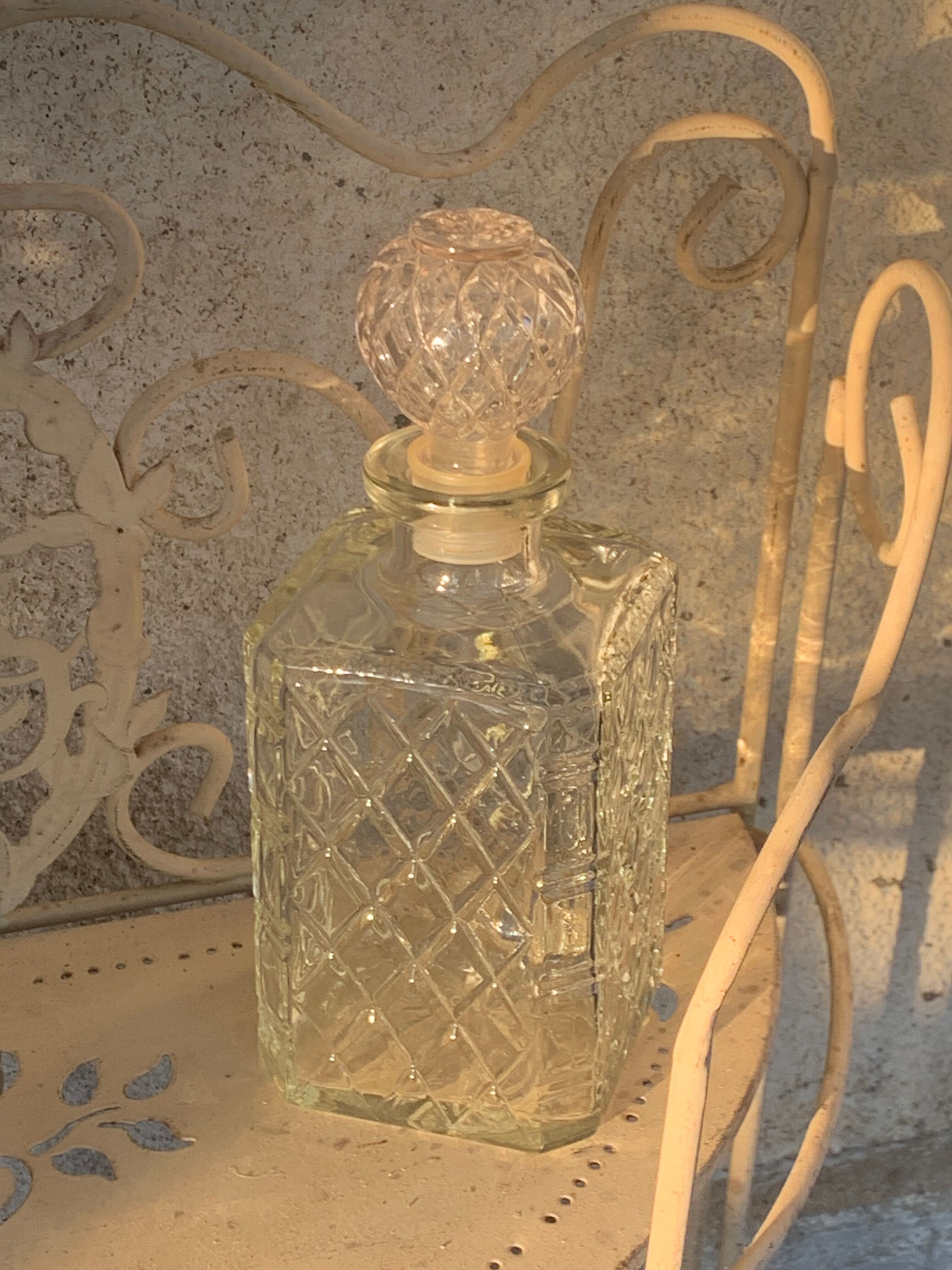 Vintage transparent molded glass whisky decanter