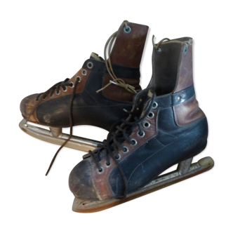 Paire de patins à glace vintage Lutra