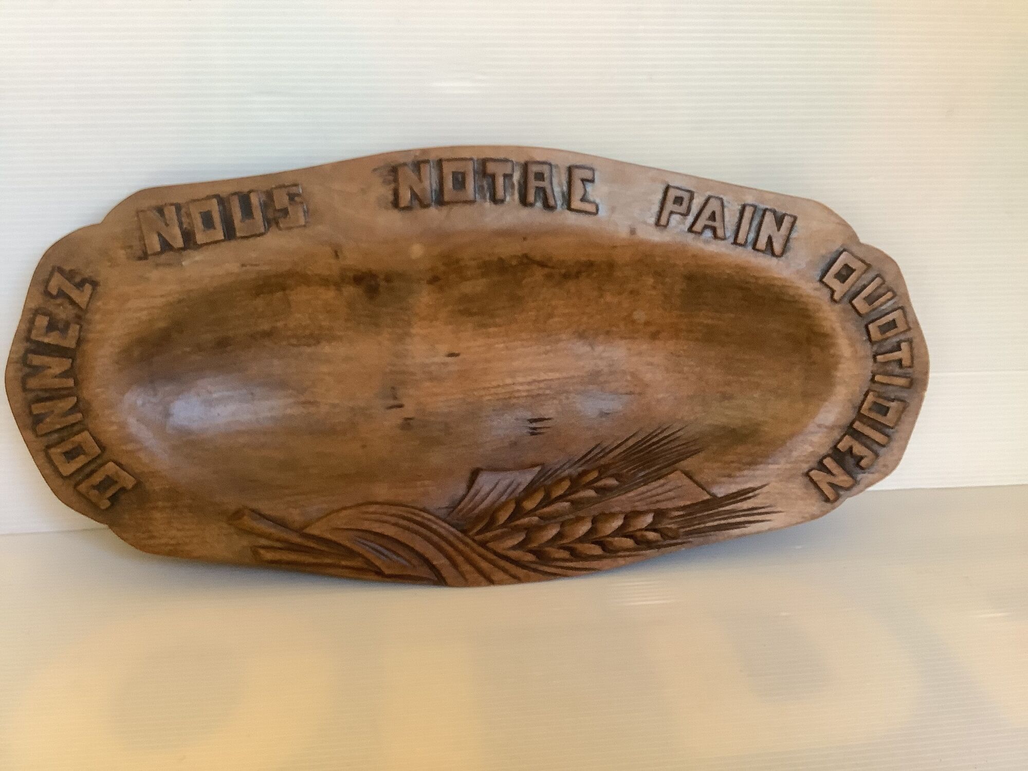 Carved wood dish ears of wheat give us our daily bread