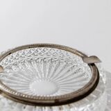 Vintage crystal glass ashtray from the 1920s, silver-edged with a textured pattern, Art Deco table decoration.